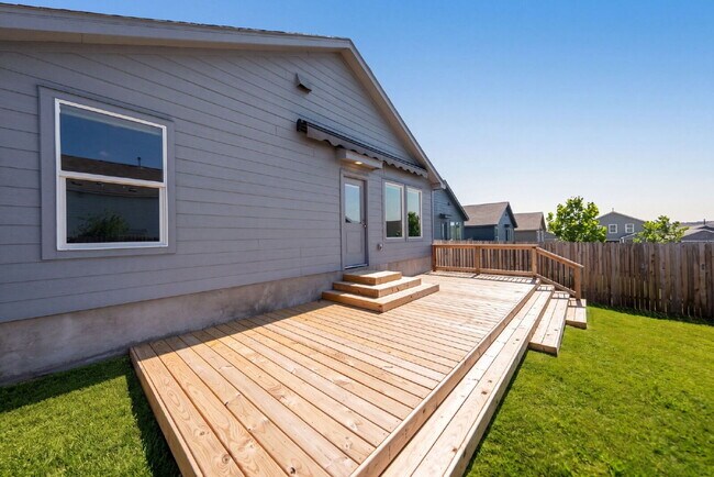 Building Photo - Stylish One Story Retreat with Open Living and Backyard Deck Escape
