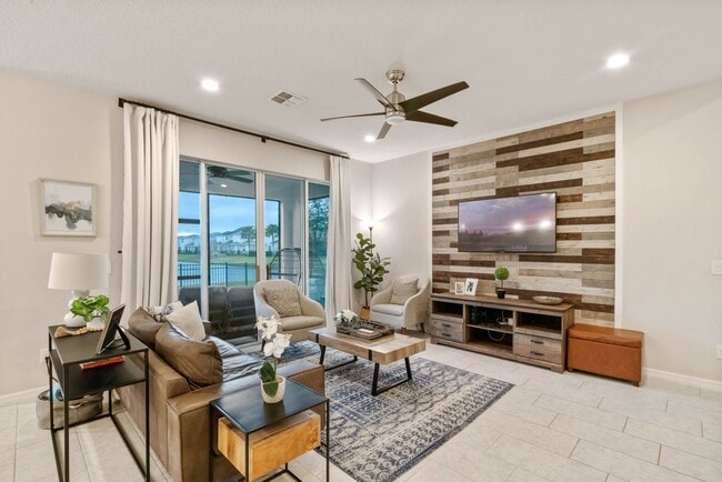 Building Photo - Water Front Home- 4 Large Bedrooms-3 baths Gated Community Call Sheila Campbell 407-687-7900