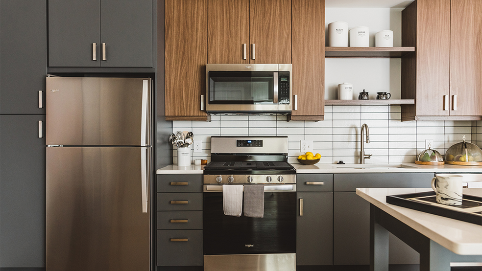 Kitchens with chef-islands, two-toned cabinetry with chrome pulls - Modera Reynoldstown