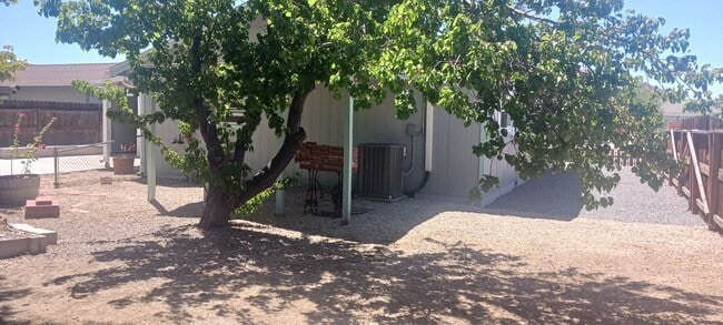Building Photo - Updated 3 bedroom with A/C and Yard