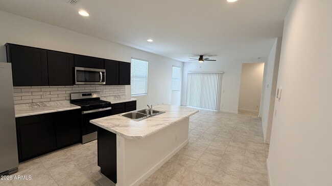 Building Photo - 39990 W Sunland Dr