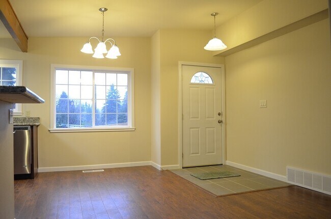 Building Photo - Updated 2-Story home with Day light basement. Big lot w/ RV & Boat parking