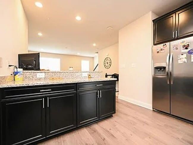 Building Photo - Stunning 3-Story Brick-Front Townhome | Modern Living + Military & First Responder Discount