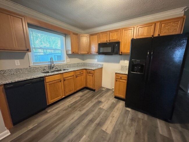 Building Photo - Move In Ready! Updated 3 Bedroom Brick House off Guess Road Near Carver St, Durham NC