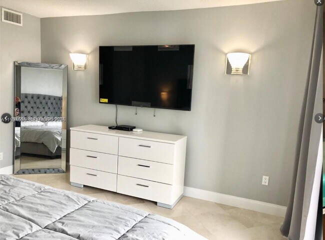 Building Photo - 19390 Collins Ave