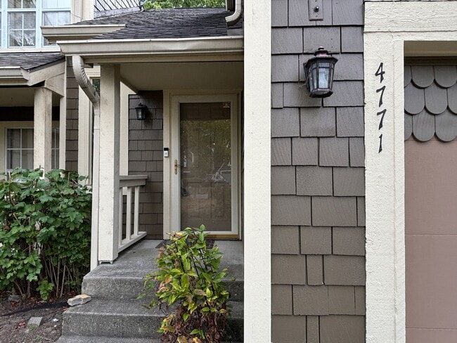 Building Photo - Charming Condo in a Can't-Miss Location – Private Deck, Garage, and Nature-Filled Community