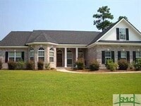 Building Photo - 4 Bed 3.5 Bath, Fenced yard, overlooks lagoon, 3 car garage, in law suite, office