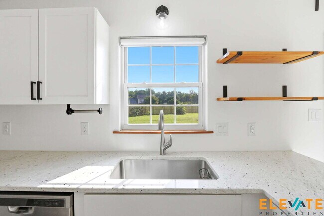 Building Photo - Beautiful Like-New 3 Bedroom Home with Huge Fenced Yard, Greenhouse & Storage