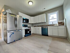 Building Photo - Brand New Unit, Central Heat, AC, In-Unit ...