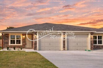 Building Photo - AVAILABLE NOW!