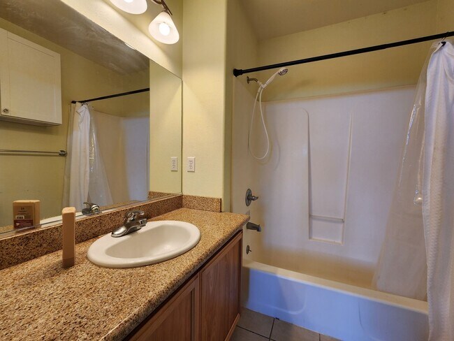 Building Photo - Modern 2BR/2.5BA Condo with Ensuite Bathro...