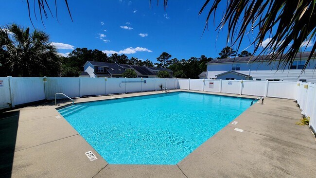 Building Photo - Beautiful 3 bed 2 1/2 bath townhome in a gated community with a pool. Showings Coming Soon!!!