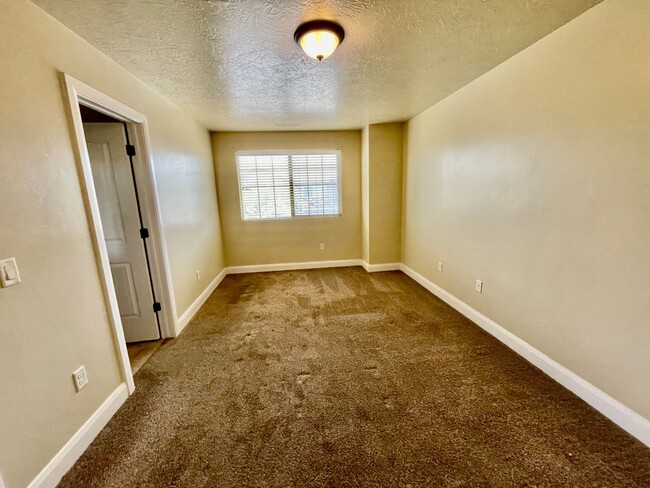 Building Photo - Pet-Friendly Three-Bedroom Townhome with G...