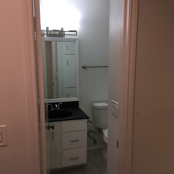 Hall bath - completely updated. - 8604 Willowick Drive