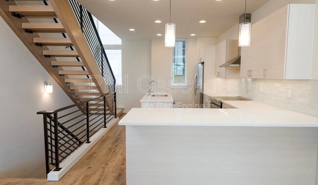 Building Photo - 9227B 16th Ave SW