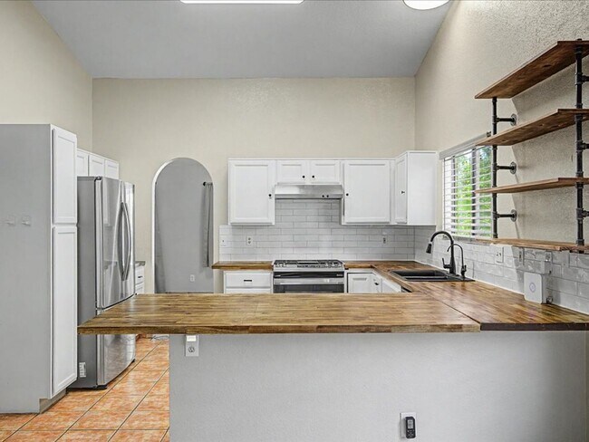 Building Photo - Spacious 4-Bedroom Home with Upgrades, Outdoor Living & Community Amenities!