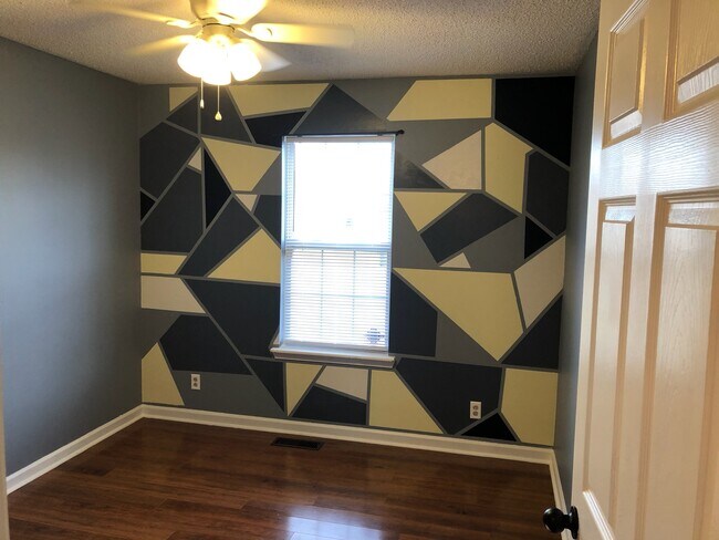 Bedroom #2 with closet space and accent wall - 101 Bowers Ct