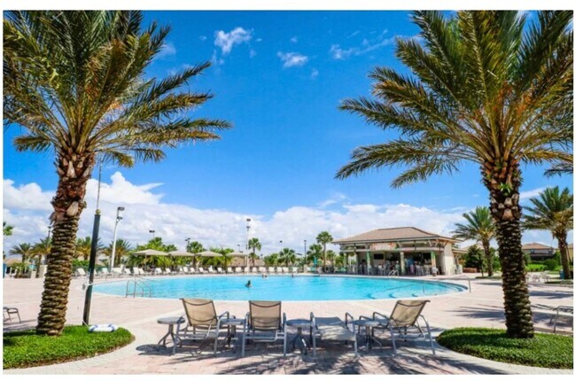 Building Photo - BEAUTIFUL CHAMPIONS GATE 2 BED 2 BATH COND0  w/GARAGE - FULLY FURNISHED - 12 MONTH RENTAL