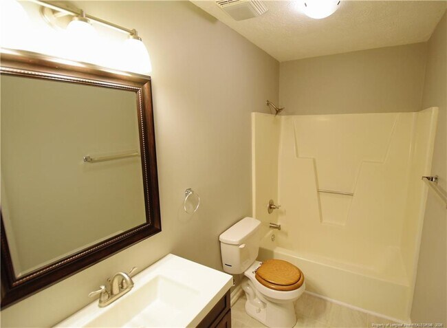 Building Photo - 6933 Woodmark Dr