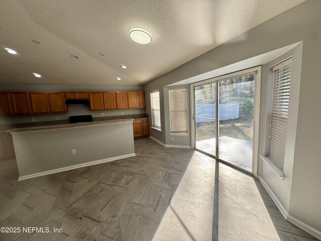 Building Photo - 11690 Brian Lakes Dr N