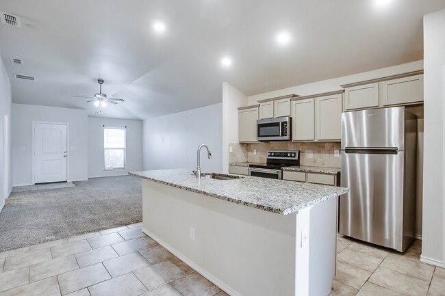 Building Photo - Granite Glam & Backyard Fun: Welcome to Yo...