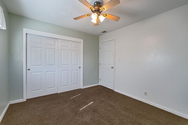 Building Photo - 3BR + Office Home in Excellent Condition with Storage Sheds and Garage Workspace!