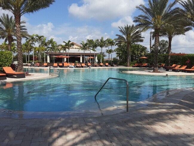 Building Photo - Seasonal/short term turnkey furnished Incredible 2/2 with den ground floor condo in resort Esplan...