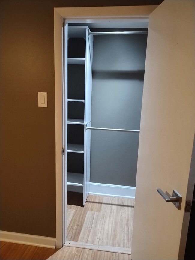 Well lit closet with shelving - 18 Porter Ave