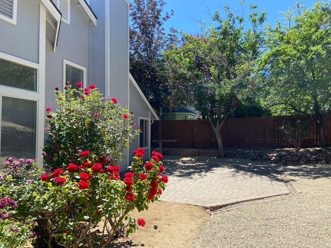Building Photo - Coming Up Roses - NW Reno 4 Bedroom/3 Car Garage Single Story House
