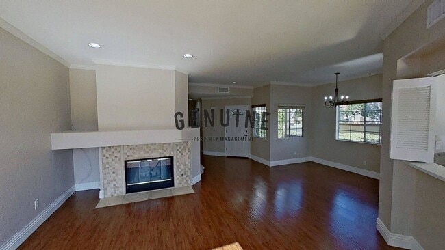 Building Photo - Dual Master Two Bedroom Townhouse in Gated...