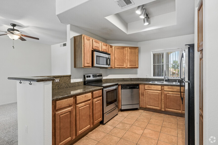 3BR, 2BA - 1,393SF - Kitchen - Portofino Condominiums
