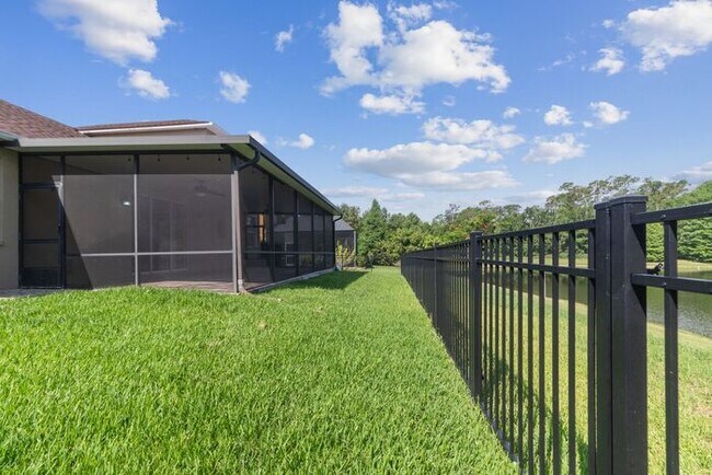 Building Photo - Executive Living Waits!