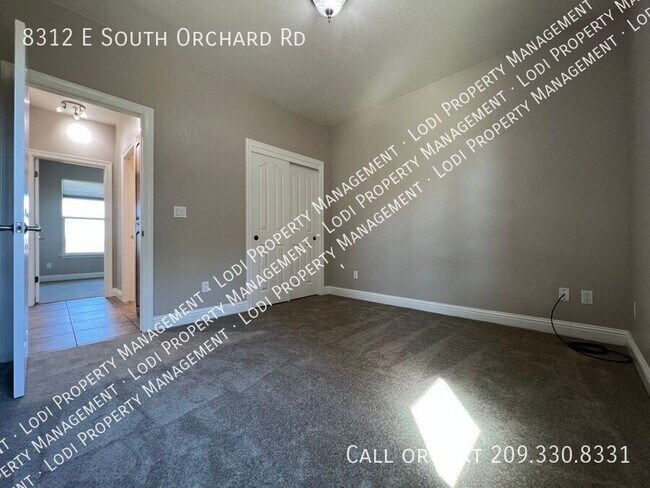 Building Photo - 8312 E Orchard Rd