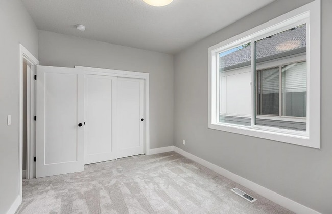 Building Photo - Stunning Bethany Farmhouse with Chef’s Kitchen, Media Room, Main-Level Suite & Luxury Designer Fi...