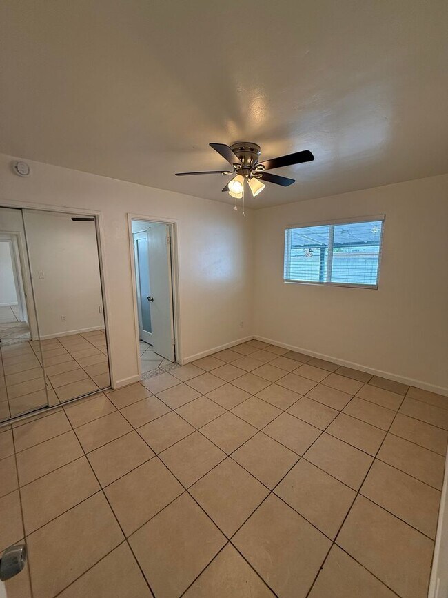 Building Photo - 4 Bedroom Home with Large Backyard | Modern Landscaping | Utilities Included