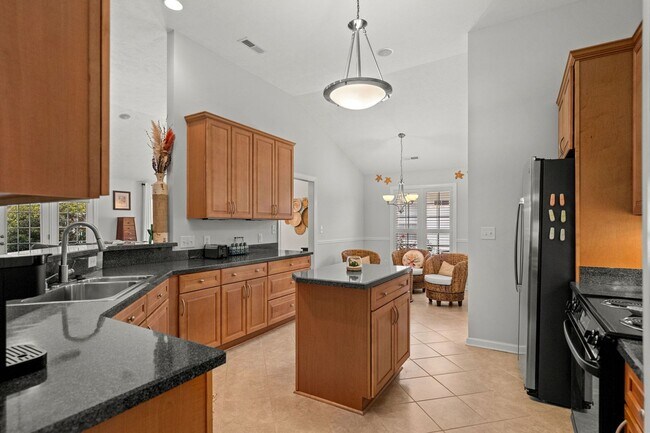 Building Photo - Live the Coastal Lifestyle in This Cypress Keys Beauty!