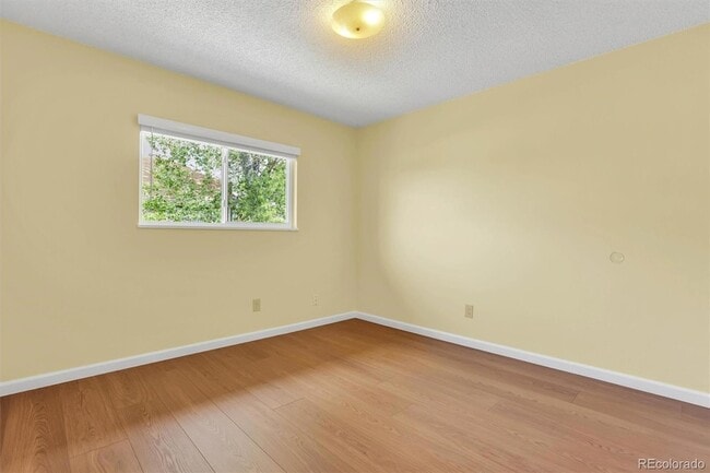 Building Photo - 8913 E Chenango Ave