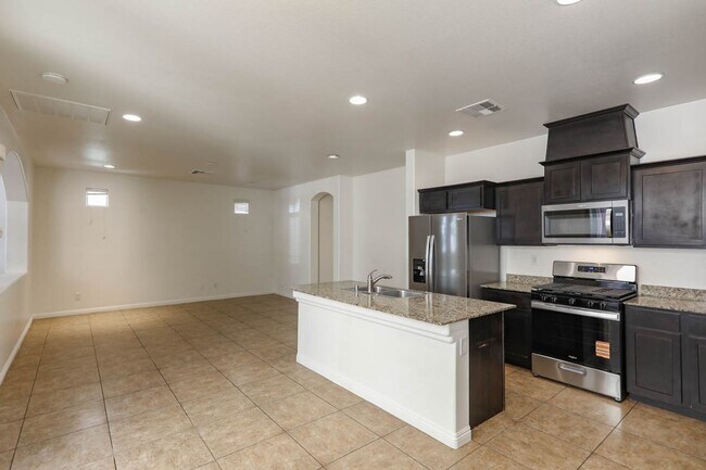 Building Photo - Nicely Upgraded Mountains Edge Gated Commu...