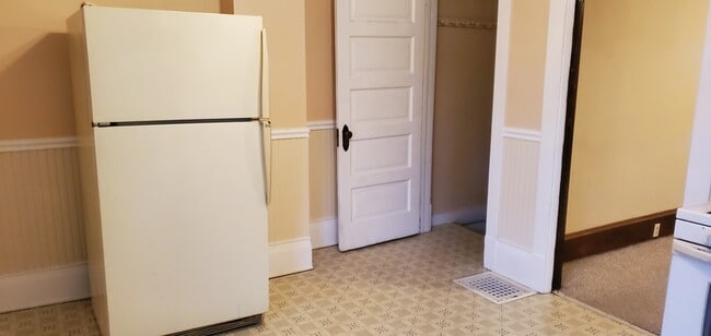Kitchen looking at Basement door - 1485 Clarence Ave