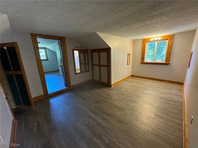 Building Photo - 6380 Woodhawk Dr