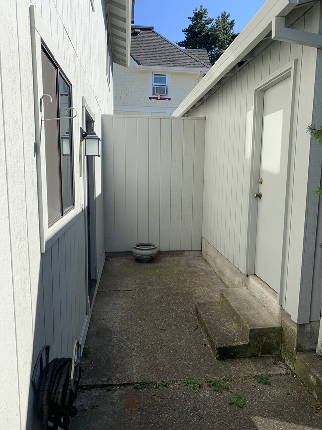 Front door (left) and garage door (right) - 3215 S Corbett Ave