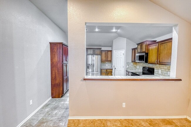 Building Photo - Beautiful three bedroom home with in-ground storm shelter!