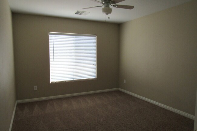 Building Photo - AMAZING 2 STORY TOWNHOME LOCATED IN A GATE...