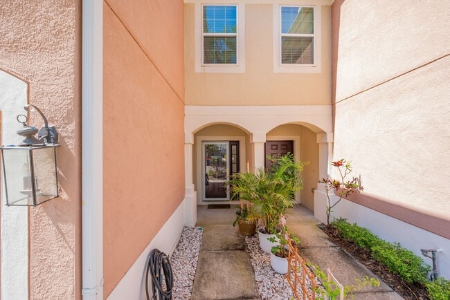 Building Photo - Furnished Townhome with Conservation View in The Bay at Cypress Creek!