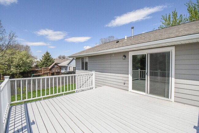 Building Photo - Updated 3BR Split-Level Home with Huge Deck, Fenced Yard & 2-Car Garage Near I-29!