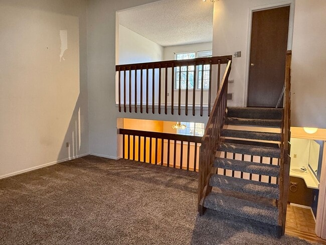Building Photo - Open Tri-Level Townhome With Tons Of Space...