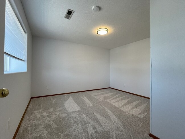 Building Photo - Spacious 4-Bedroom, 2.5-Bathroom Home with...
