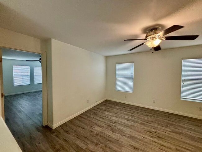 Building Photo - Welcome to this charming 4 bedroom, 2.5 bathroom home.