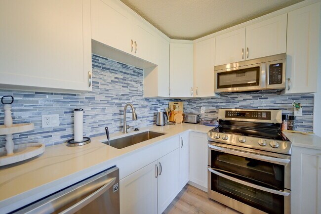 Building Photo - Available February 1st, 2026!  Cocoa Beach Waterfront Condo