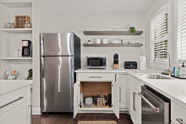 Building Photo - Classic Brick Ranch with Modern Updates and Expansive Backyard